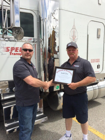 Greg Flear is recognized following his championship run at the Toronto Regional Truck Driving Championships.