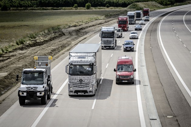 A disabled vehicle on the shoulder causes the autonomous truck to edge to the left edge of its lane.