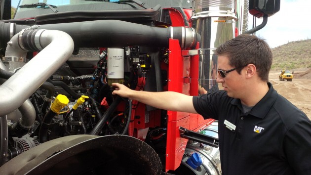 Cat's Charles Pepper indicates how frequently used service items are easily accessible.