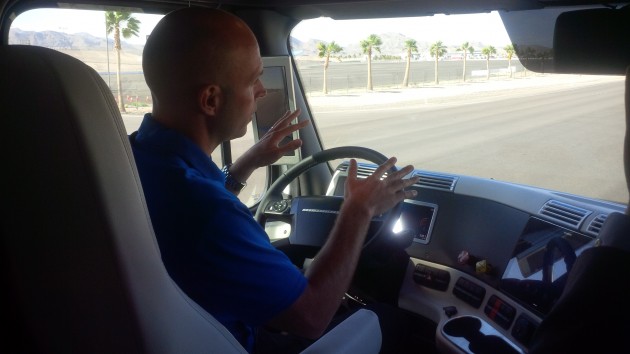 A driver demonstrates hands-free driving using Highway Pilot.