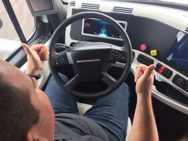 James Menzies removes his hands from the wheel while in Highway Pilot mode.