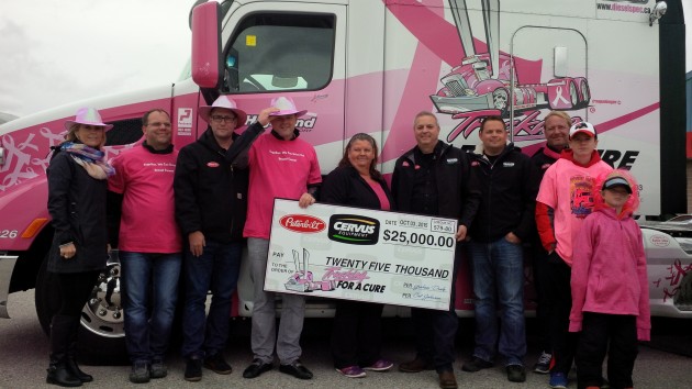 Cervus Equipment presents a cheque for $25K.