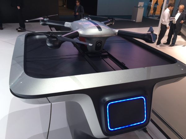 The drone sits on a landing pad, to which the parcel is delivered.