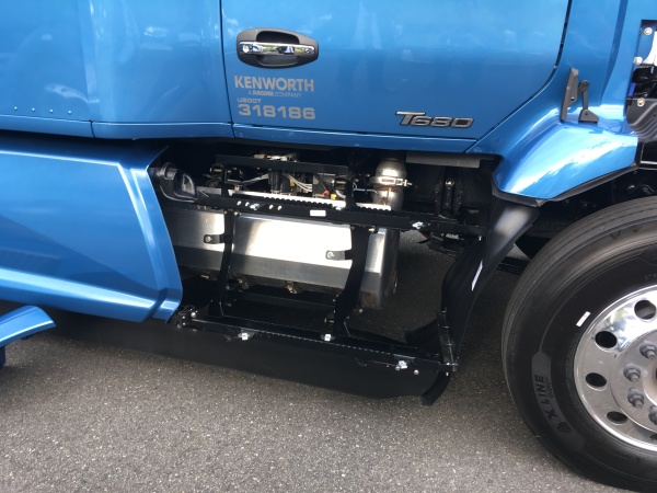 A new single-box aftertreatment system reduces weight and takes up less frame rail space.